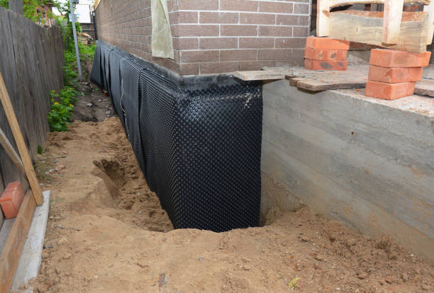 Happy homeowners after waterproofing job in Wauseon